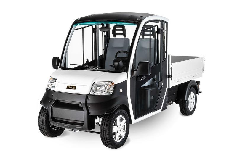 Frontale Ansicht des Club Car Elektrotransporters URBAN N1 mit Fahrerkabine und großer Ladefläche.